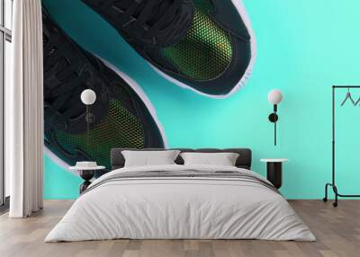 Pair of sport shoes on colorful background. copy space.Overhead shot of running shoes. Top view, flat lay Wall mural