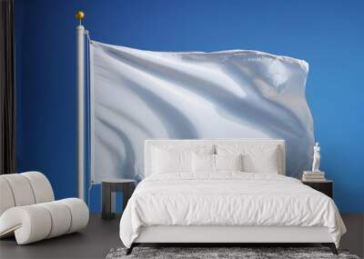 Empty white clear flag waving against clean blue sky, close up, isolated with clipping path mask alpha channel transparency Wall mural