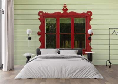 Decorative red framed window on old light green painted wood wall. Wall mural