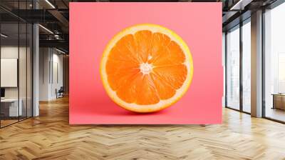 close up of a Orange Isolated on vivid background. Wall mural