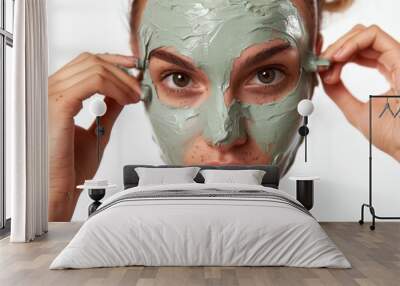 Woman putting on a clay mask, isolated on white background, dicut PNG style Wall mural