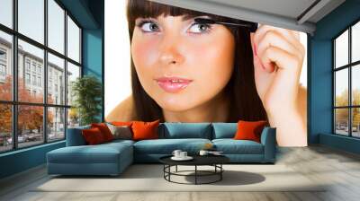 woman brunette applying make up mirror reflection Wall mural