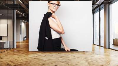 young  business woman wearing glasses Wall mural