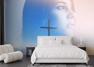 Double multiply exposure abstract portrait of a dreamy cute young woman head silhouette in light sky, sunrise mountain view with christian cross. God faith, holy worship, gratitude woman pray concept. Wall mural