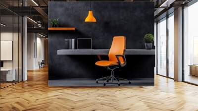 A modern home office stands out with its orange chair, black walls, and a sleek floating shelf. Wall mural