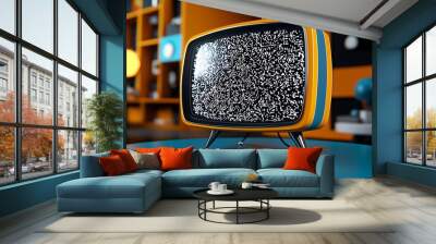 A retro TV, static flickering, sits on a blue table in a vivid orange room. Wall mural