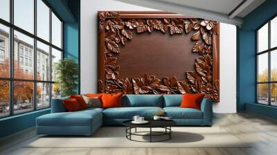 An ornate wooden frame with floral carvings stands isolated against a white background. Wall mural