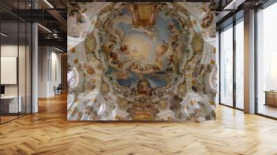 Close-up of the ornate ceiling fresco in the Wieskirche, a baroque pilgrimage church in Germany, depicting religious scenes with intricate detail.. Wall mural