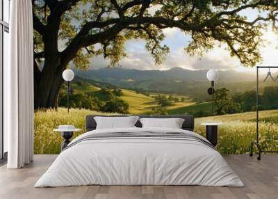 Oak Tree Framing a Sunlit Meadow and Rolling Hills Wall mural