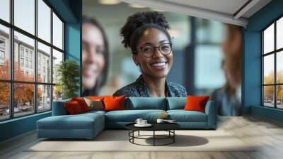 Portrait of a Smiling Woman Wearing Glasses in a Professional Setting Wall mural