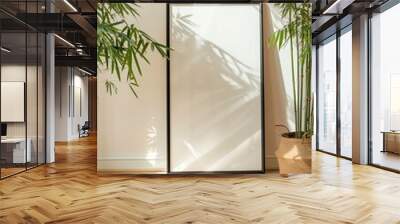 A vertical frame in a yoga studio, soft natural lighting, serene and minimalist decor. Background of bamboo plants, light wooden floors, soft earthy tones. 2:3 Wall mural