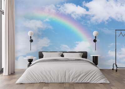 beautiful classic rainbow across in the blue sky after the rain Wall mural