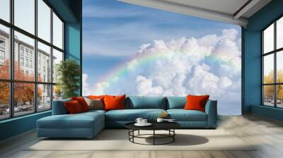 beautiful classic rainbow across in the blue sky after the rain Wall mural