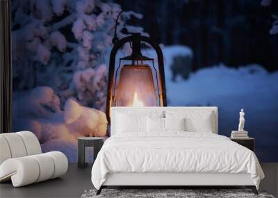 Burning vintage lantern in winter night forest. Beautiful winter background.
 Wall mural