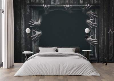 Hands rising out from the old window ancient house, Halloween concept. Increased noise and grain effect. Wall mural