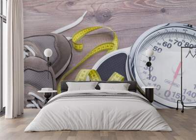 Tape measure, running shoes and weighing scales Wall mural