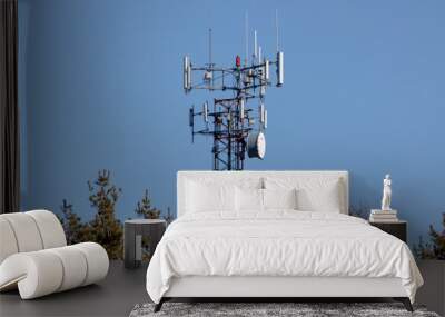 transmission tower on blue sky Wall mural