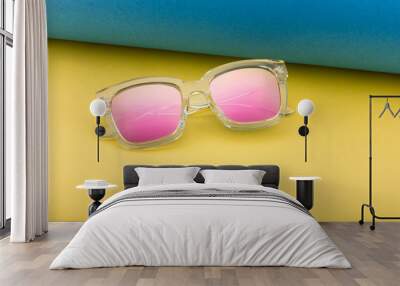 Creative shoot for cool and stylish sunglasses with different lighting and cool props Wall mural