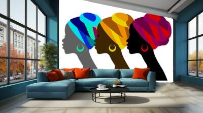 Black silhouette of the head of a young black woman in profile with a colorful headwear isolated on white. Vector illustration Wall mural