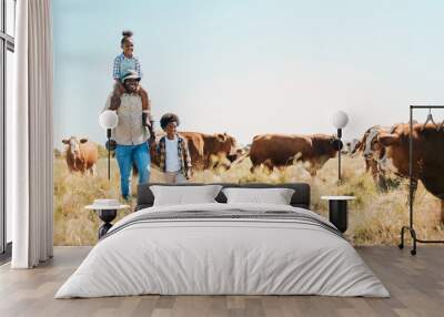 Cattle farm, father and children or family outdoor for travel, sustainability and holiday. Black man and kids walking on a field for farmer adventure in countryside with cows and banner in Africa Wall mural