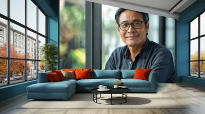 Portrait of successful smiling businessman, Asian man with wrinkled hands in casual shirt looking out window, mature man in glasses working inside modern, Generative AI Wall mural