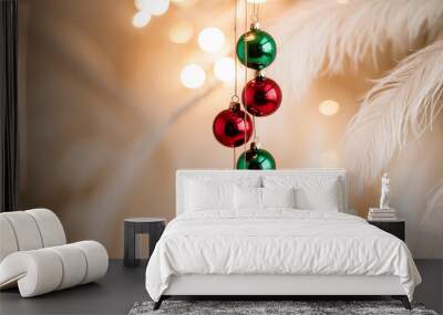 Decorative hanging red and green Christmas ornaments with twinkling lights in a cozy indoor setting during the holiday season Wall mural