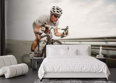 cyclist pedaling on a racing bike outdoor Wall mural