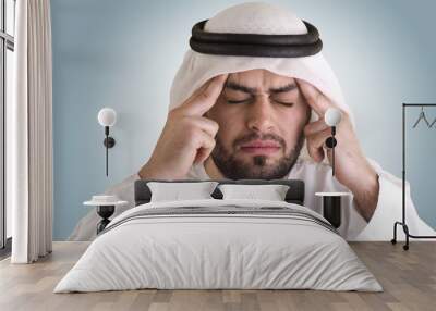 arabian man having a headache- clipping path included Wall mural