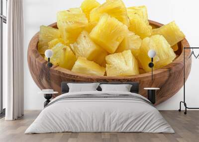 pineapple cubes in wooden bowl isolated on white background Wall mural