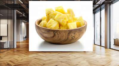 pineapple cubes in wooden bowl isolated on white background Wall mural