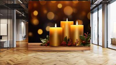 Romantic golden candles on wooden table with blurred sparkling bokeh background. Christmas lights with copy space. Wall mural