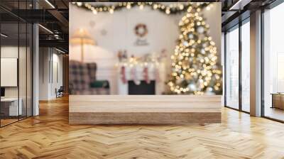 Empty wooden table over defocused christmas background with copy space Wall mural