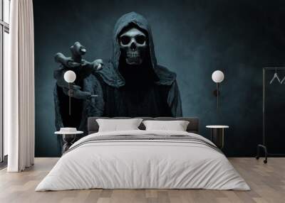 Grim reaper reaching towards the camera over dark background with copy space Wall mural