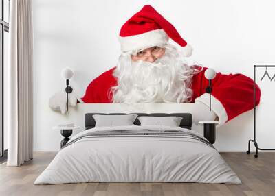 Santa Claus pointing in blank banner Wall mural