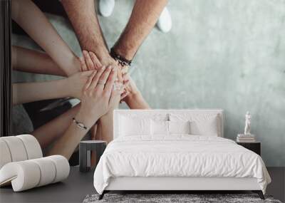 Teamwork, unity concept, group of friends put their hands together with copy space Wall mural