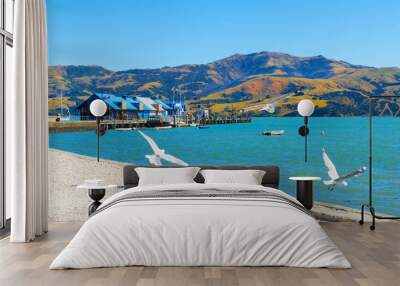 Panoramic View of Akaroa Beach on the Banks Peninsula, southeast of Christchurch, South Island, New Zealand. Wharf Akaroa harbour. Wall mural