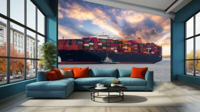 Logistics and container loading by large barges by sea in a harbor full of containers waiting to be transported Wall mural