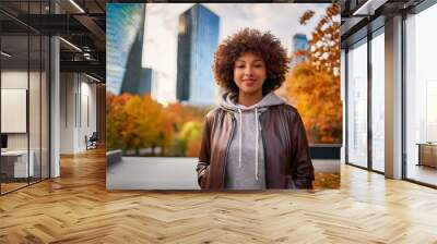 Happy Woman's Autumn Portrait: Outdoor Headshot with Smiling Expression and Copyspace Wall mural