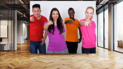 Studio shot of happy diverse group of multi ethnic friends smili Wall mural