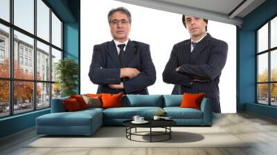 Studio shot of young and senior Persian businessman with arms cr Wall mural