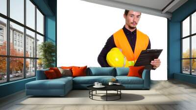 Studio shot of young handsome man construction worker holding ha Wall mural