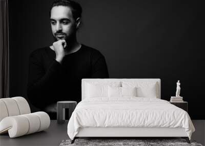 Young bearded Indian man in black and white Wall mural