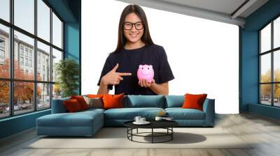 Young happy Asian teenage girl smiling while pointing finger and Wall mural