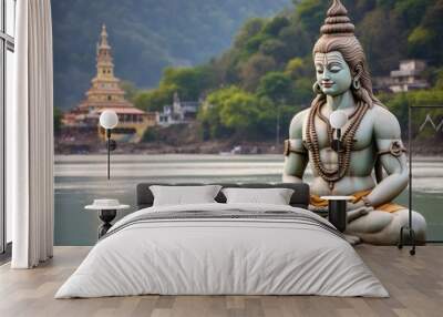 Rishikesh, India. Statue of Shiva sitting in meditation on the riverbank of Ganga in Rishikesh, Generative AI Wall mural