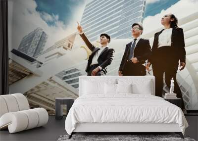 Group Asian businessmen Walking in city And looking forward Business world is constantly changing. Must have developed to keep pace with the world. In order not to be unemployed. Must have leadership. Wall mural