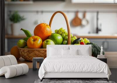 collection of fresh fruits and vegetables in a wooden basket on a table in a modern kitchen background blur Wall mural