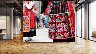 Woman dancing and wearing one of the traditional folk costume from Portugal Wall mural