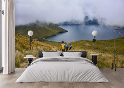 Trekkers at the beautiful Lagunas de Mojanda from the Fuya Fuya trail, Otavalo, Ecuador Wall mural