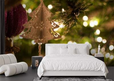 Graphic resource of a Christmas tree ball with Christmas lights around. Wall mural