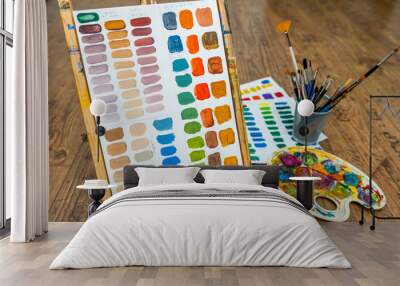 easel with color mixing exercise on paper Wall mural